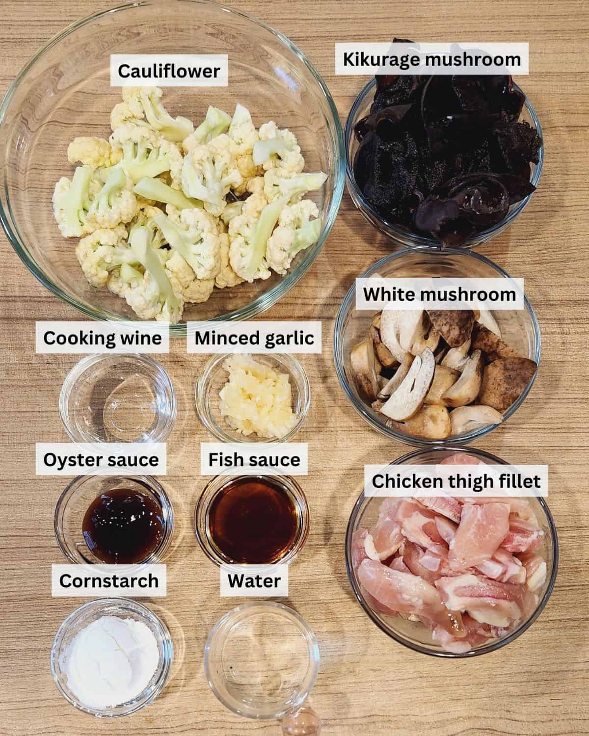 A photo of kikurage mushroom chicken cauliflower ingredients with labels.