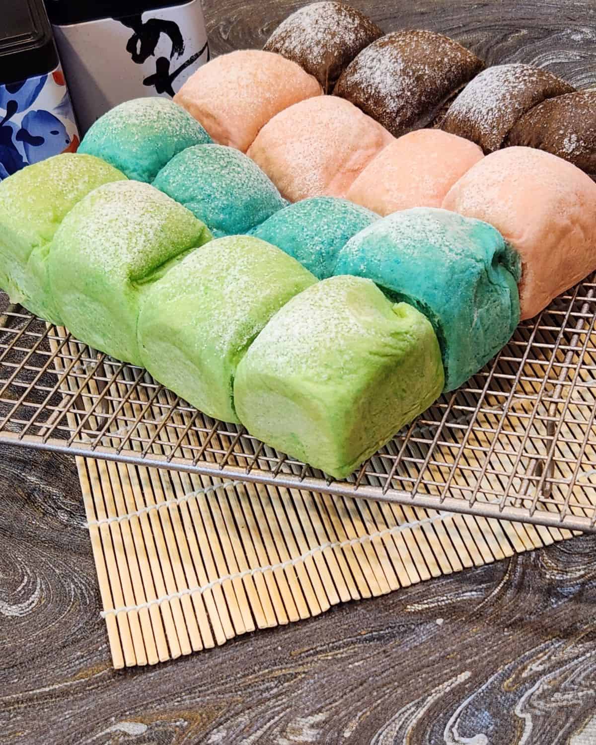 Colorful Japanese Milk Bread on a wire rack. 