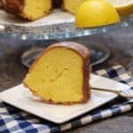 A slice of lemon butter cake on a white plate.