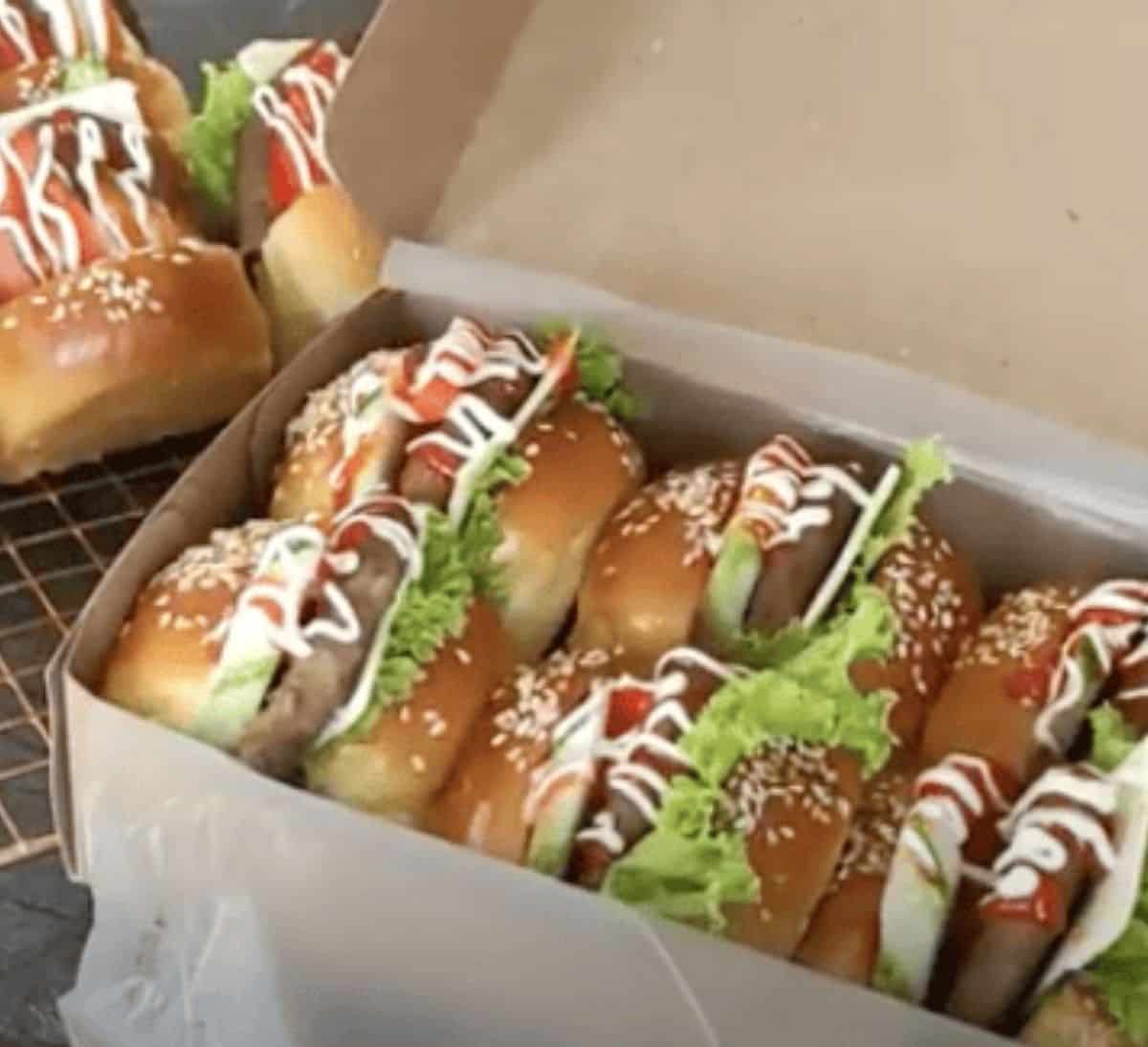 A pack of mini burger buns ready to take out.