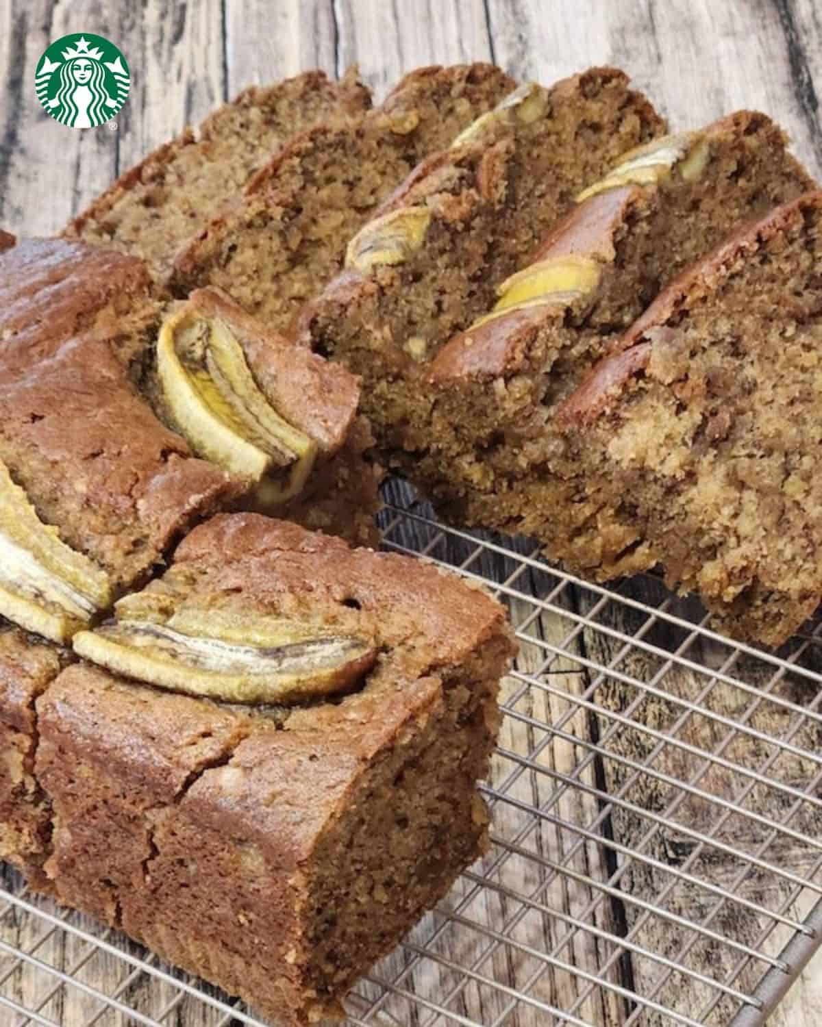 Copycat starbucks banana bread in slices on a wire rack.