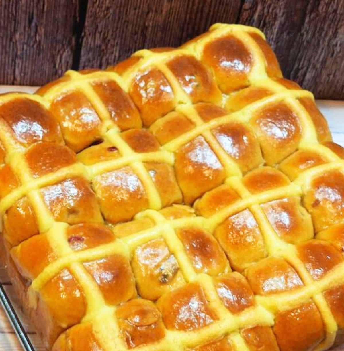 A loaf of hot cross buns fresh from the oven.