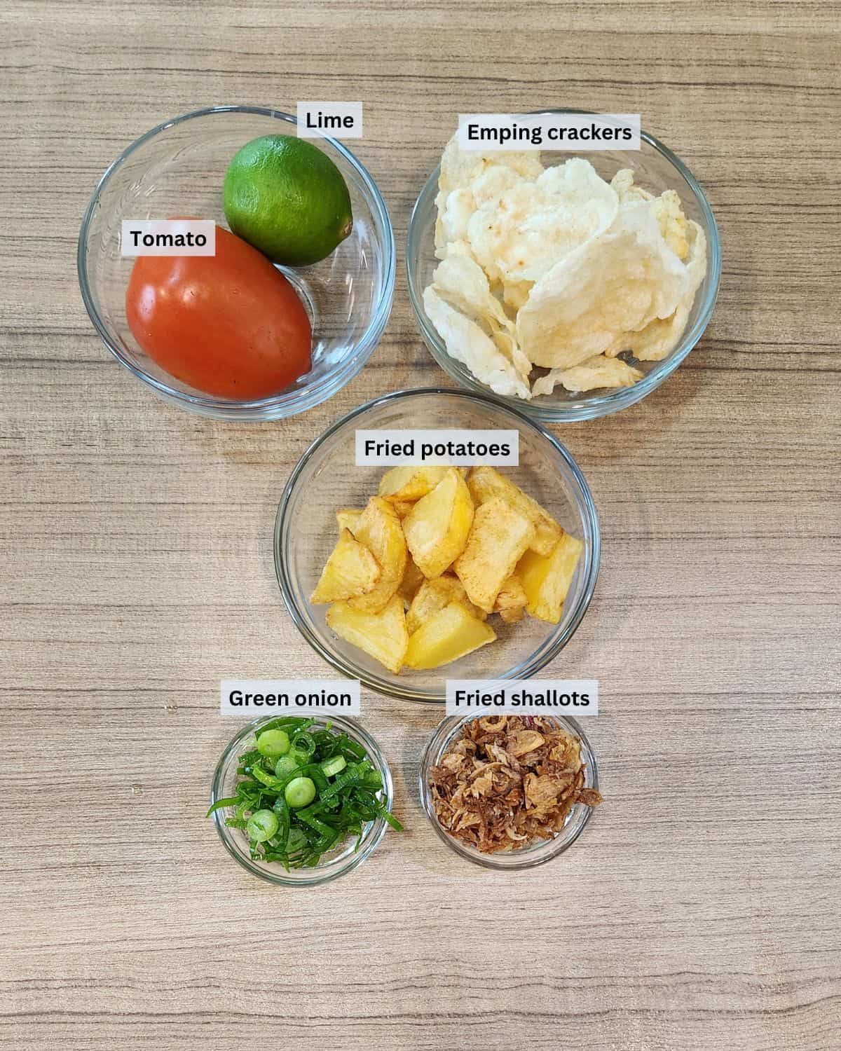 Soto betawi topping ingredients with labels.