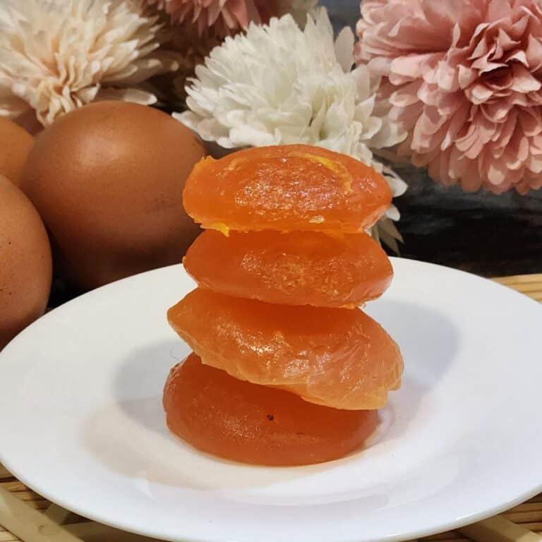 A stack of salted cured egg yolks ready to be grated for pasta toppings.