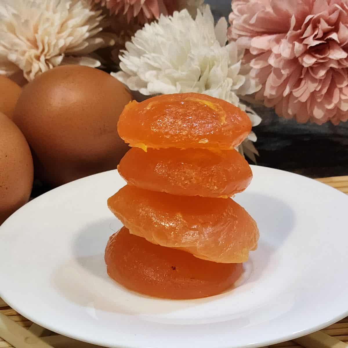 A stack of salted cured egg yolks ready to be grated for pasta toppings.