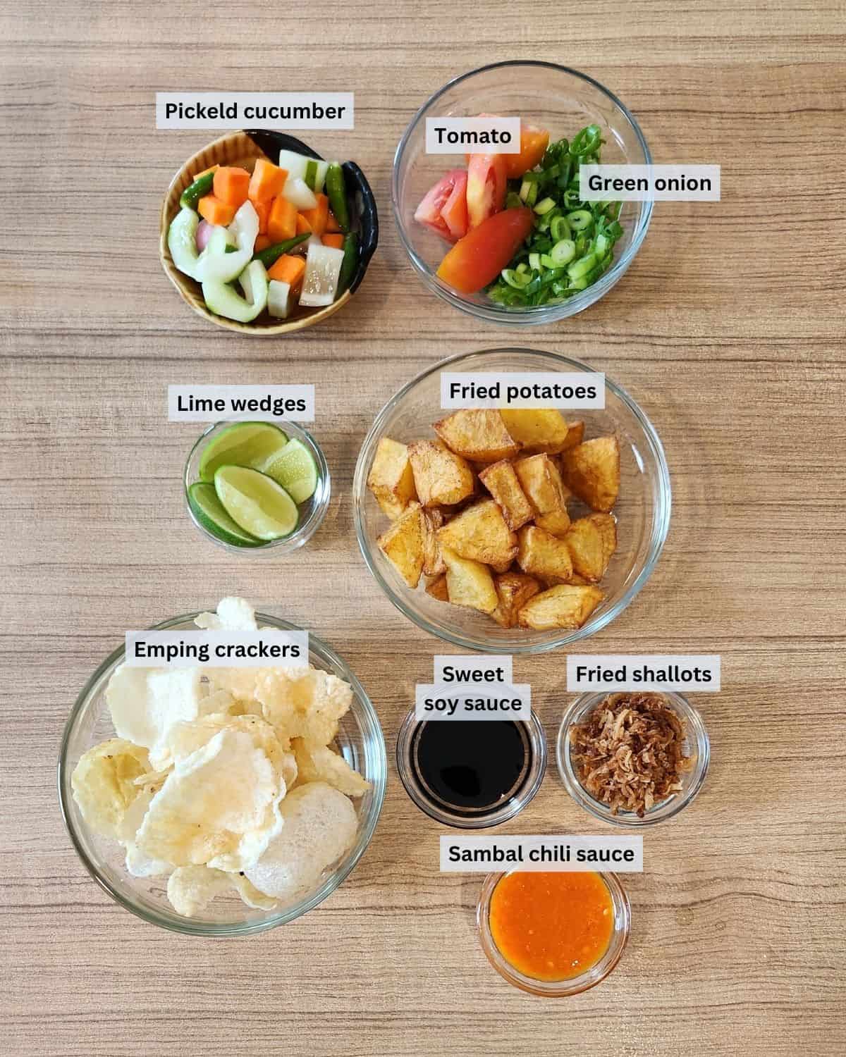 Soto Tangkar topping ingredients with labels.